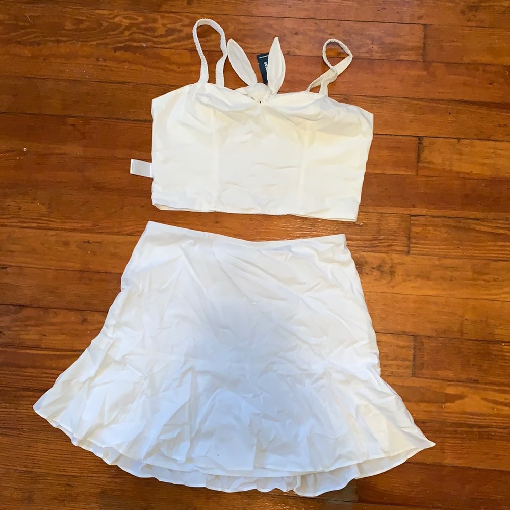 Two piece white crop top and skirt